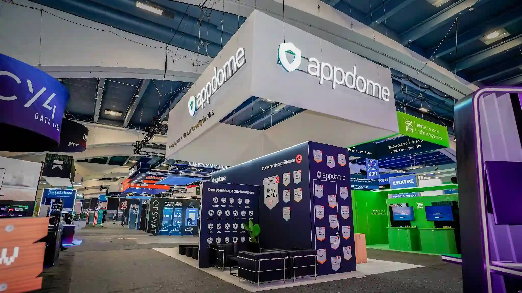 The white Appdome hanging sign suspended above the booth structures on the RSA Conference 2026 show floor