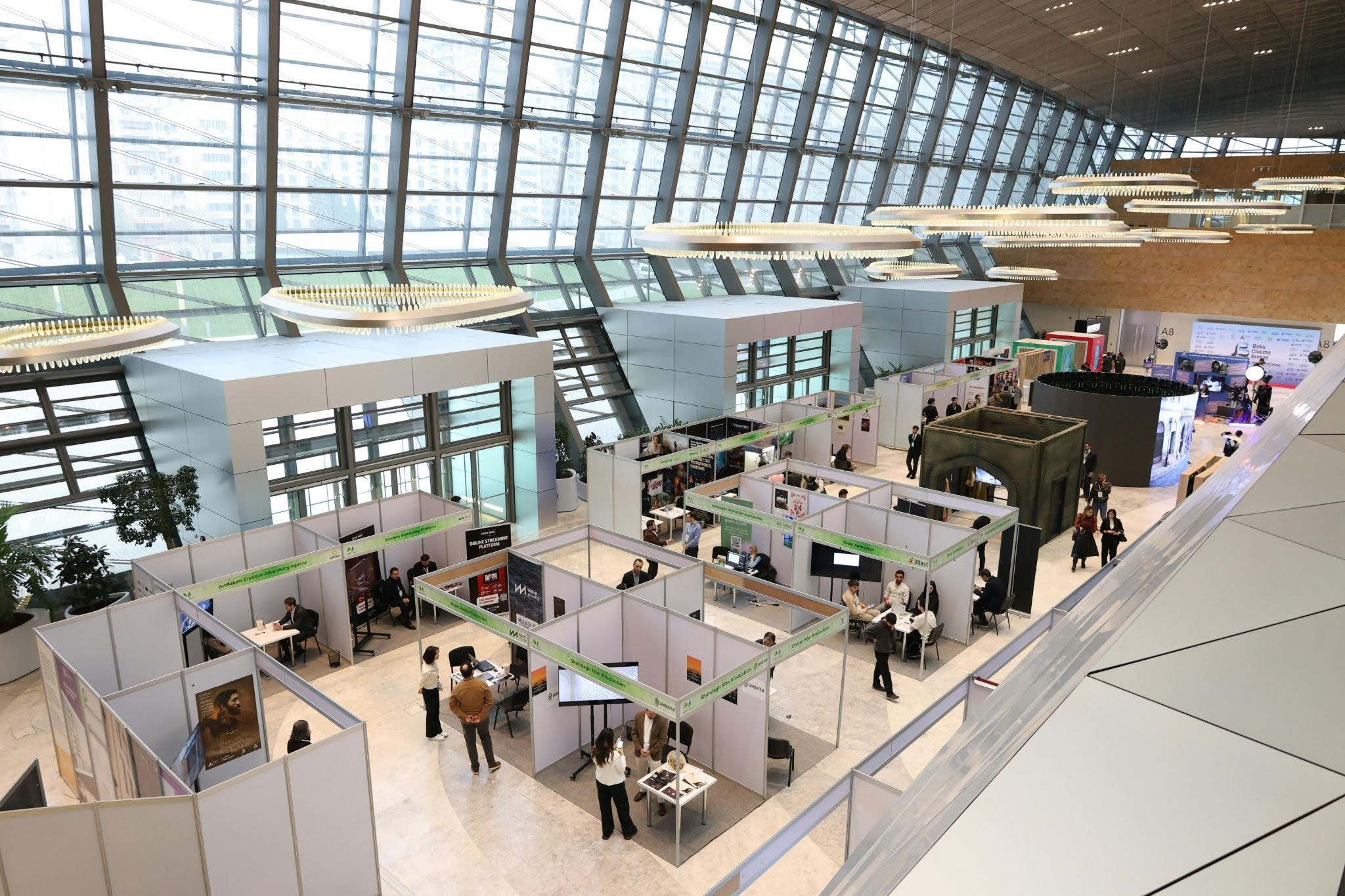 trade show booth design trends 2026 — modern exhibit with backlit graphics, LED lighting, and open layout trade show booth design trends 2026 — modern exhibit with backlit graphics, LED lighting, and open layout