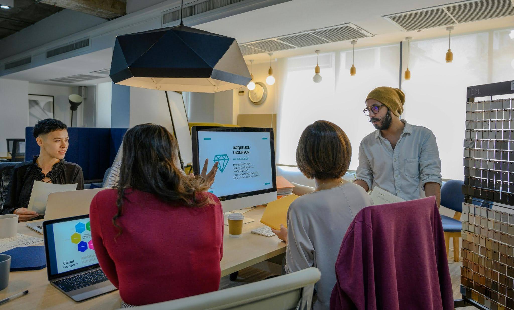 Early-stage startup founders choosing a compact, well-designed 10x10 exhibit booth at a major trade show Early-stage startup founders choosing a compact, well-designed 10x10 exhibit booth at a major trade show