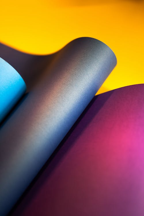 Side-by-side of backlit fabric lightbox panel and direct-print rigid Dibond panel on trade show booth