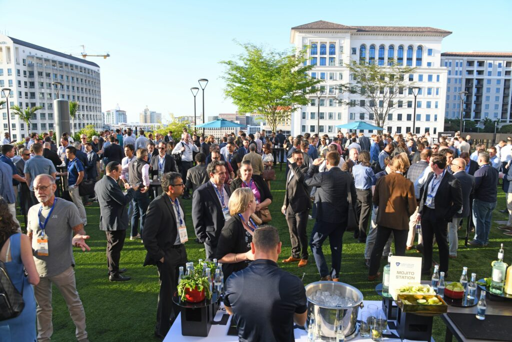 Orange County Convention Center exterior with exhibitor activity and signage