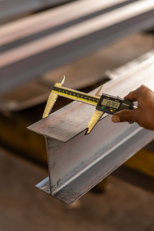 Warehouse technician inspecting a crated trade show booth before it ships to a show