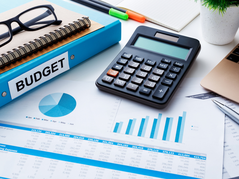 trade show expense planning documents on a table