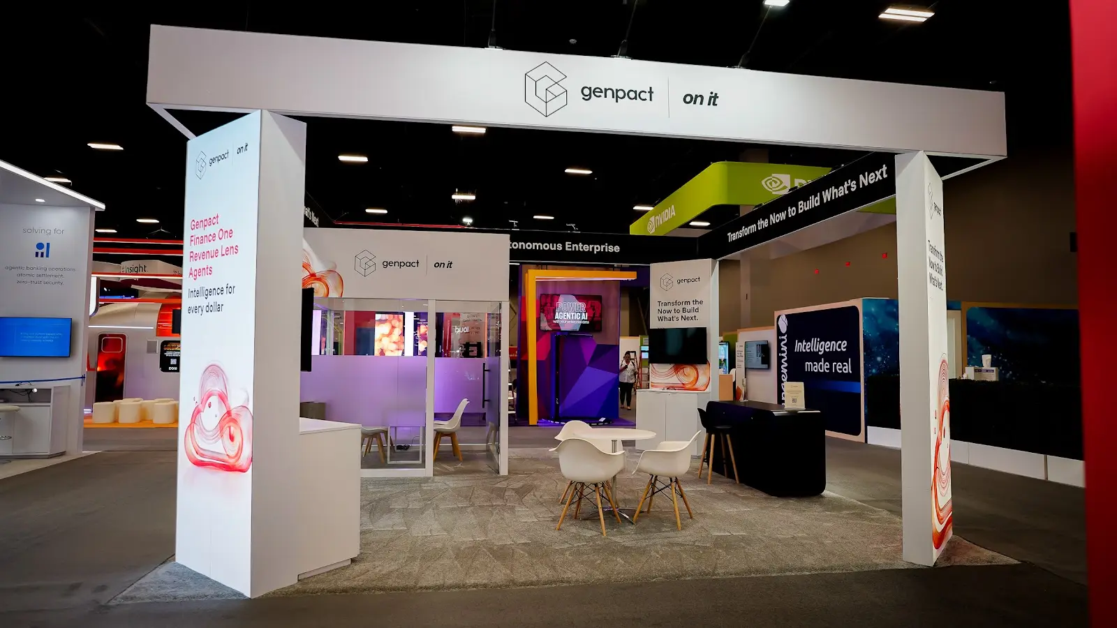 Modern island exhibit structure for Genpact at Google Cloud Next 2026, showing the restrained material palette pitched at finance executives