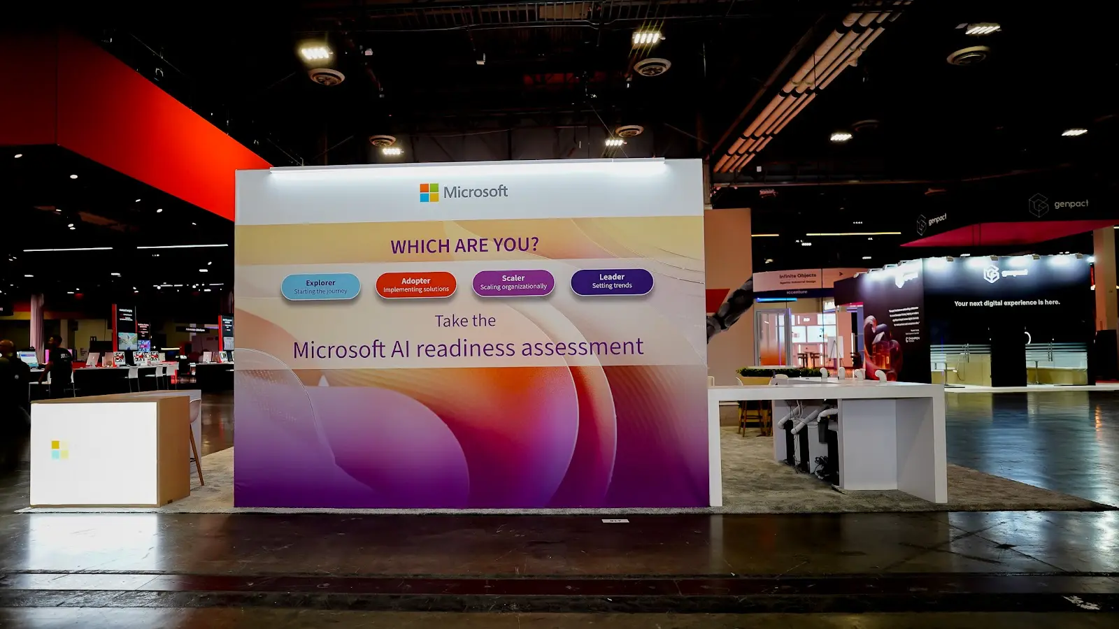 Wide view of the Microsoft AI readiness assessment booth at Adobe Summit 2026 in Las Vegas, showing the full 20x20 exhibit under show conditions