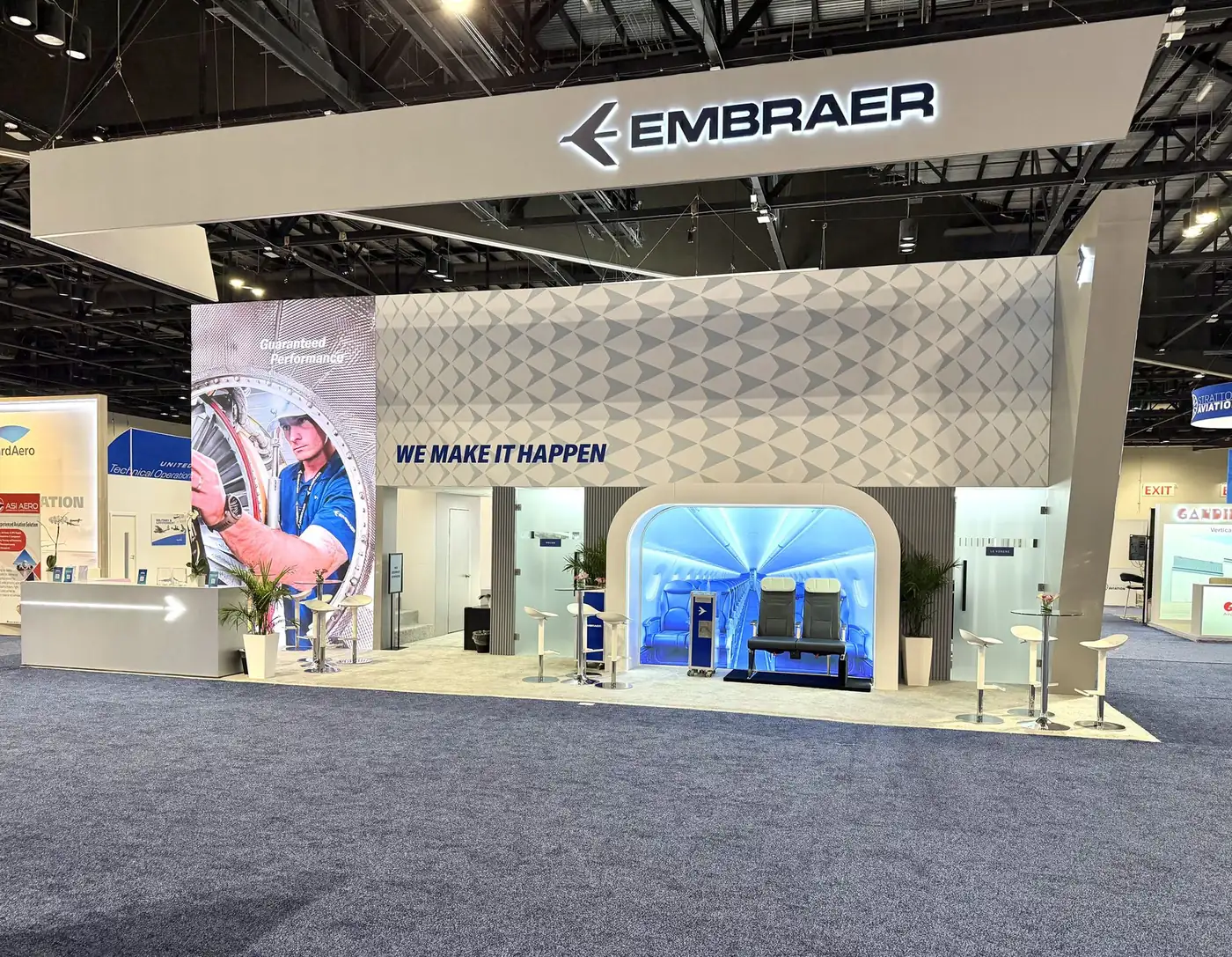 Embraer 25x40 double-deck exhibit at MRO Americas 2026 in Orlando, built by Pure Exhibits