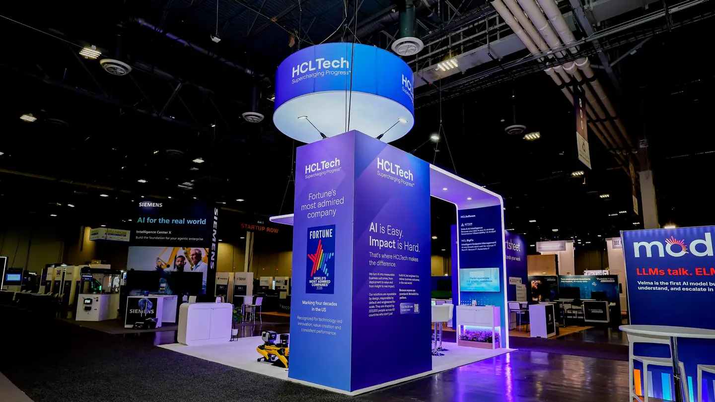 Branded tower at the corner of the HCLTech Ai4 2026 booth