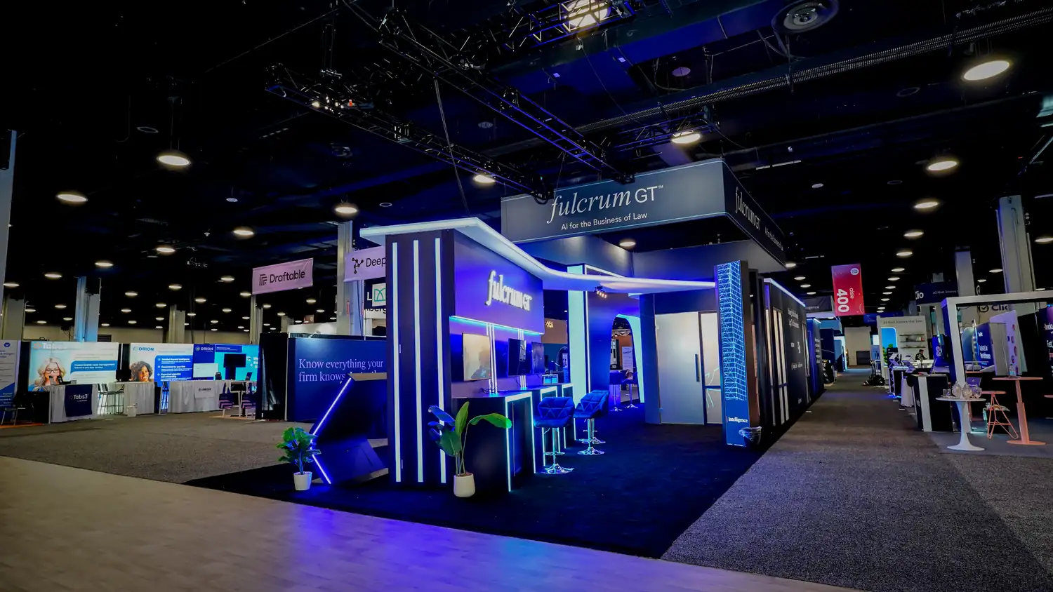 Fulcrum GT 20x80 island exhibit at ILTACON 2026 in Nashville, corner view