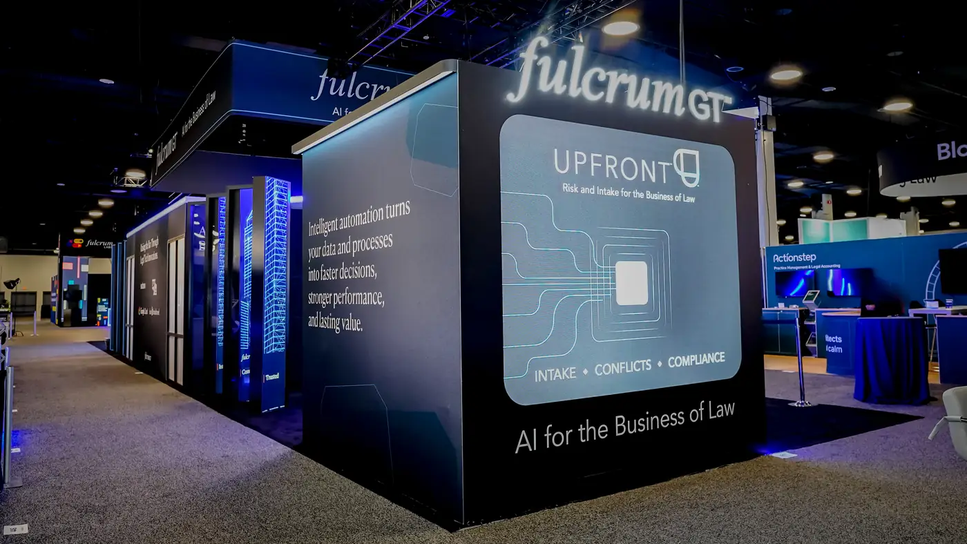 Fulcrum GT 20x80 island booth at ILTACON 2026 with a full-width LED wall at the front, backlit Fulcrum branding and blue product graphics at the Gaylord Opryland in Nashville