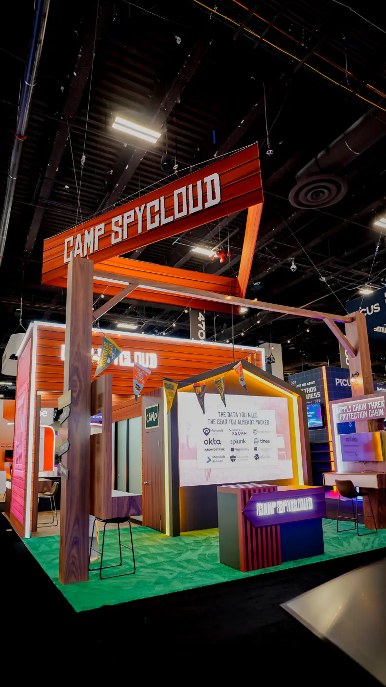 Camp SpyCloud A-frame lightbox listing integration partners including Microsoft Sentinel, Okta, Splunk, CrowdStrike and Elastic